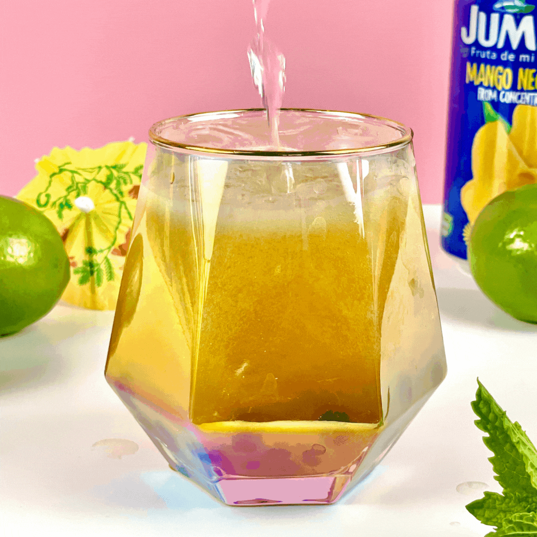 Gif of Mango Pineapple Boba Punch overflowing from cup, using BOBABAM's instant boba drink kits